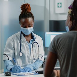 Image african-american-doctor-preparing-prescription from Freepick
